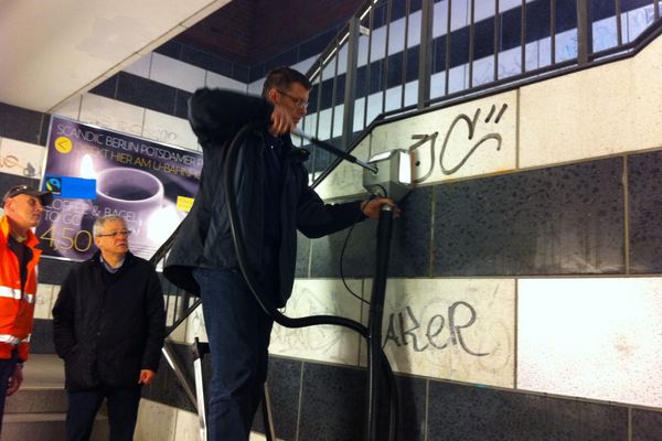 removing grafftiti in Metro station
