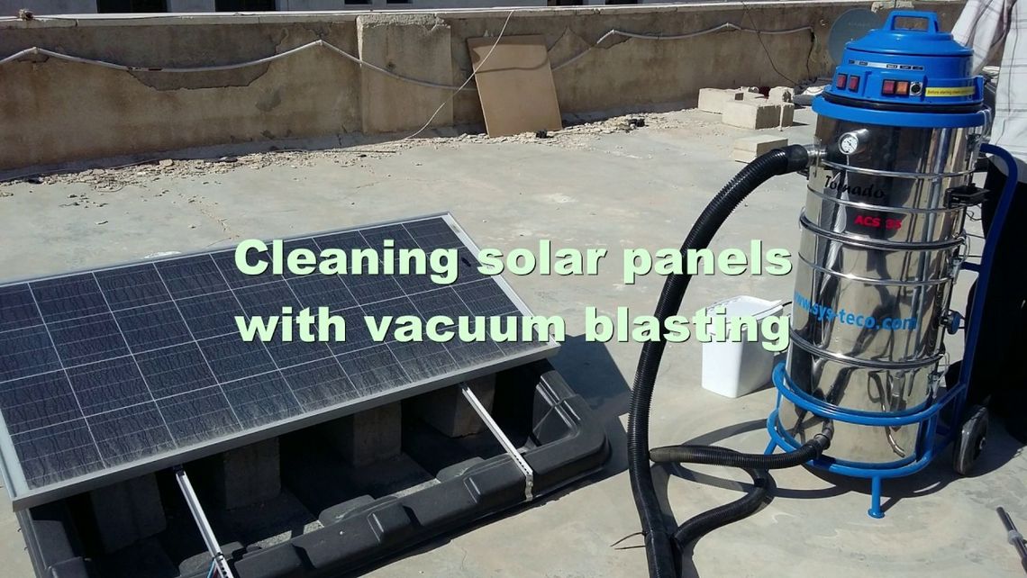 Cleaning solar panels with vacuum blasting