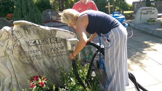 Cleaning marble gravestone