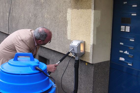 dirt cleaning off plaster facade