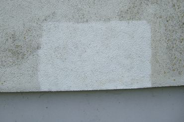 moss removal on EIFFS facade with vacuum blast method EIFS facade cleaning with systeco