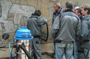 graffiti removal on roughcast